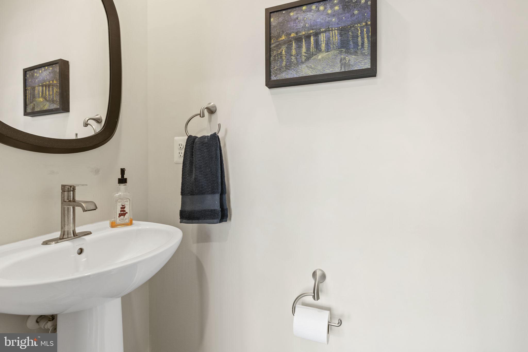 2045 Ivory Brook Road Baltimore, MD 21244 - Photo 13 of 39 a bathroom with a sink and a mirror