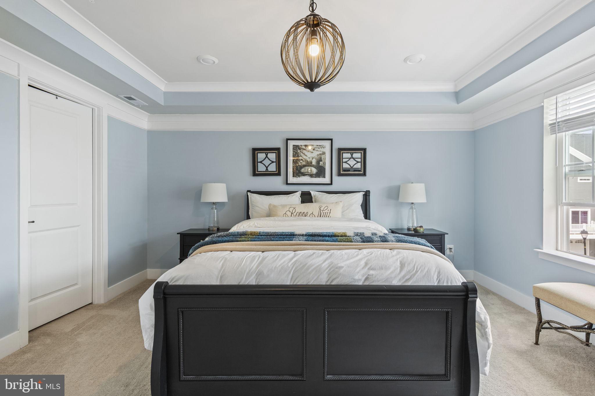 2045 Ivory Brook Road Baltimore, MD 21244 - Photo 17 of 39 a bedroom with a bed and a window