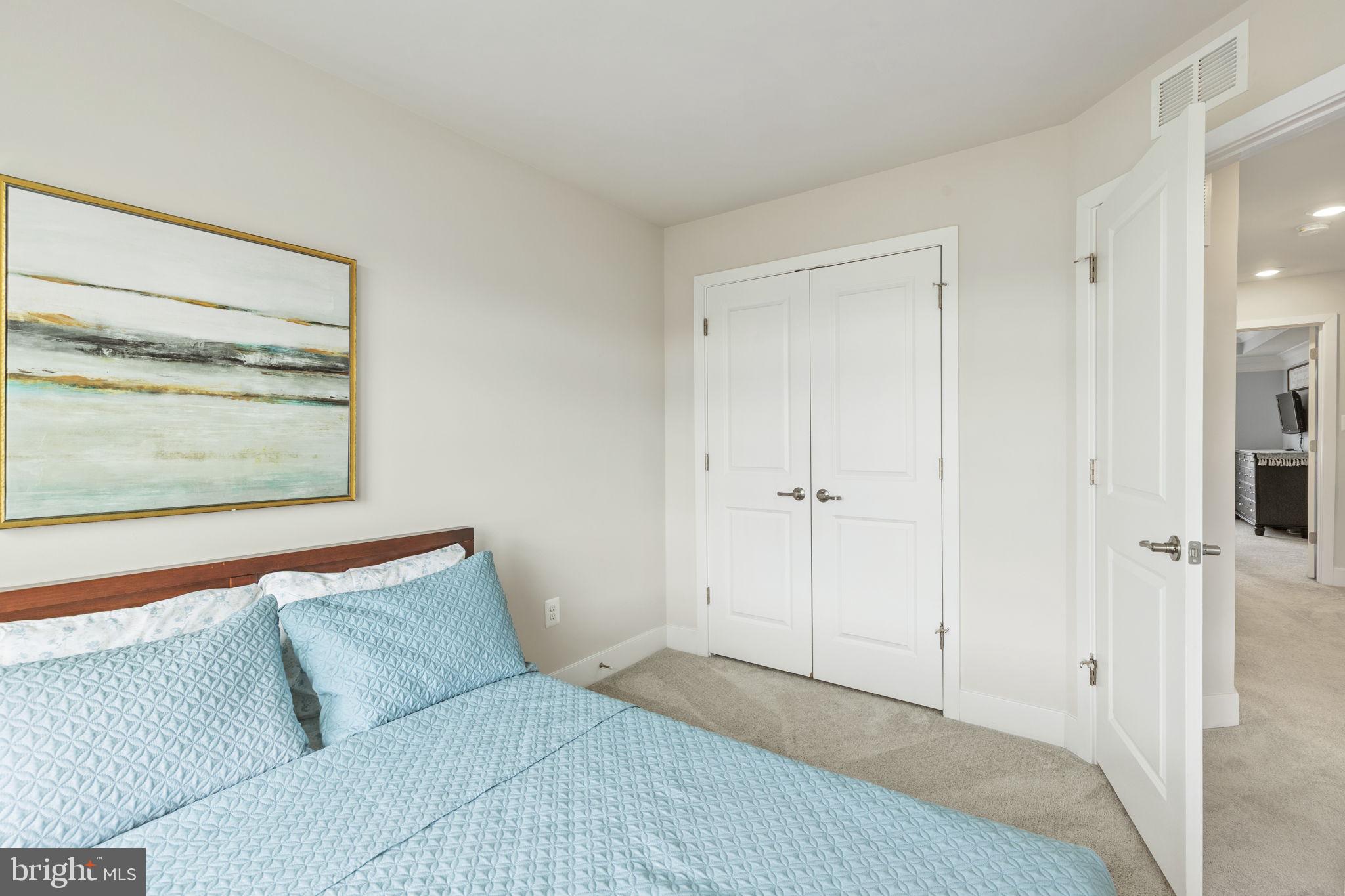 2045 Ivory Brook Road Baltimore, MD 21244 - Photo 23 of 39 a bedroom with a bed and a window