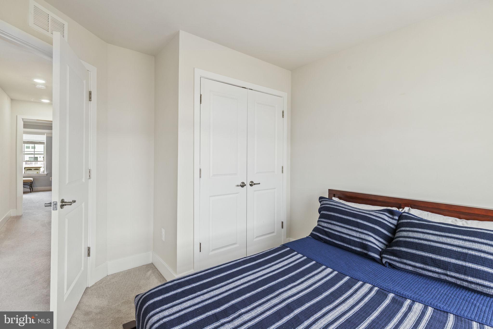 2045 Ivory Brook Road Baltimore, MD 21244 - Photo 25 of 39 a view of room with wooden floor