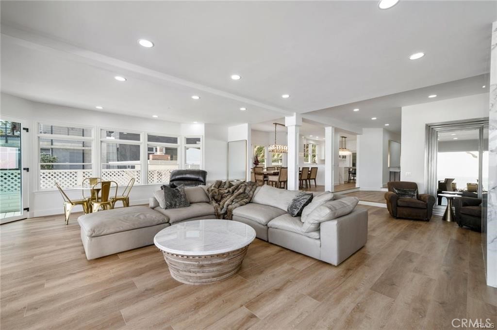 35555 Beach Road Dana Point, CA 92624 - Photo 15 of 68 a living room with furniture and a wooden floor