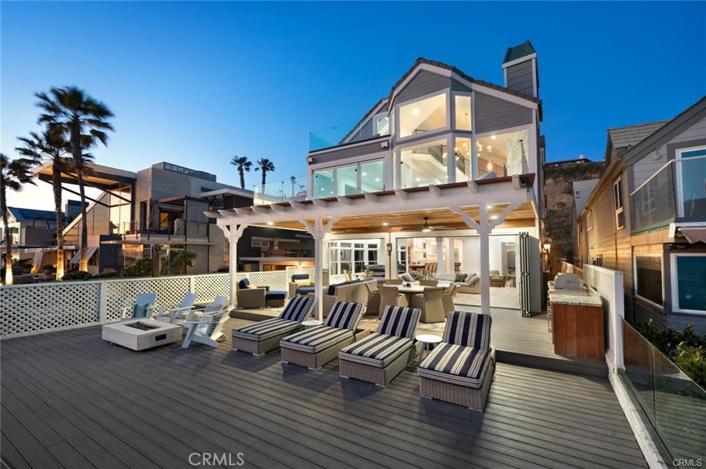 35555 Beach Road Dana Point, CA 92624 - Photo 2 of 68 a front view of a house with outdoor seating