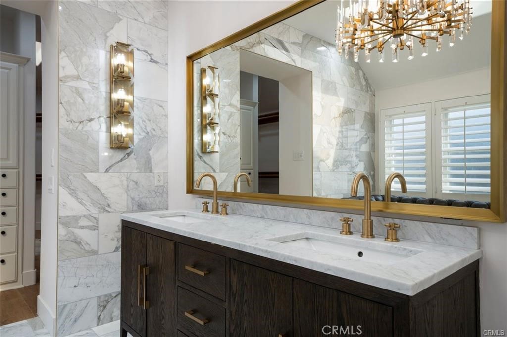 35555 Beach Road Dana Point, CA 92624 - Photo 26 of 68 a bathroom with a sink double vanity and a mirror