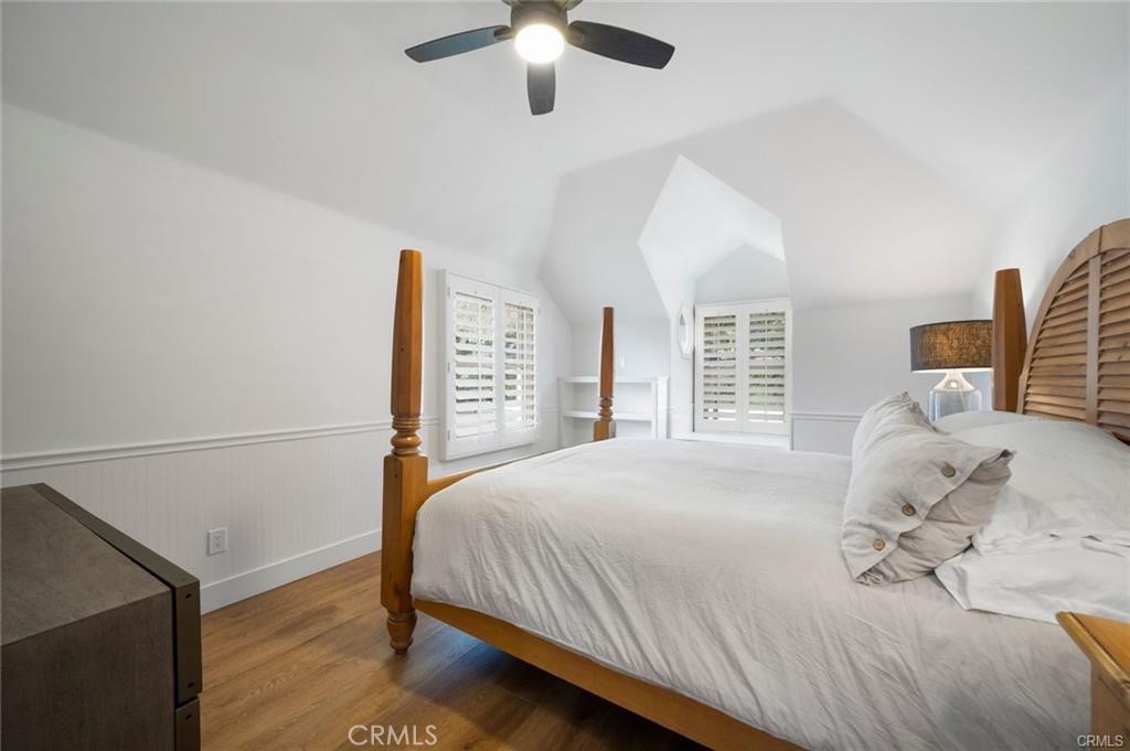 35555 Beach Road Dana Point, CA 92624 - Photo 27 of 68 a bed sitting in a bedroom next to a window