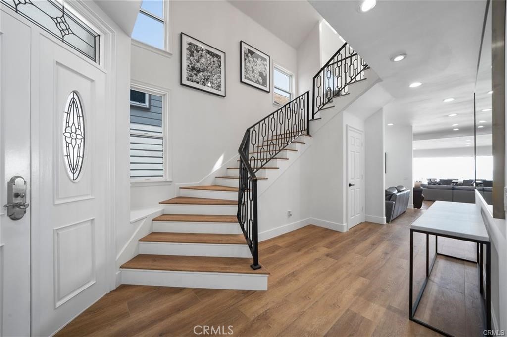 35555 Beach Road Dana Point, CA 92624 - Photo 29 of 68 a view of entryway and hall with wooden floor