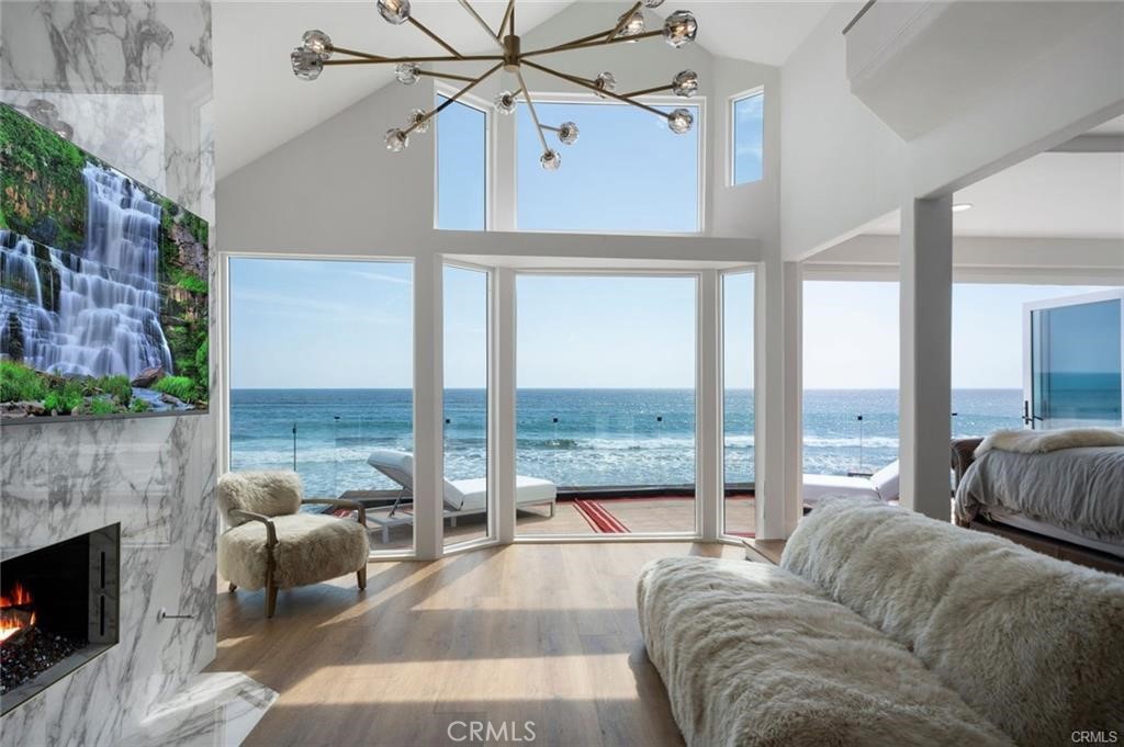35555 Beach Road Dana Point, CA 92624 - Photo 40 of 68 a living room with furniture and a fireplace