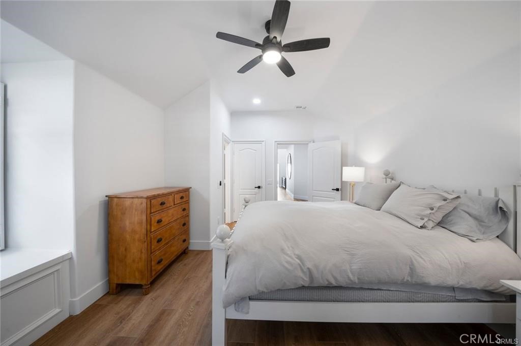 35555 Beach Road Dana Point, CA 92624 - Photo 41 of 68 a bedroom with a bed and a ceiling fan