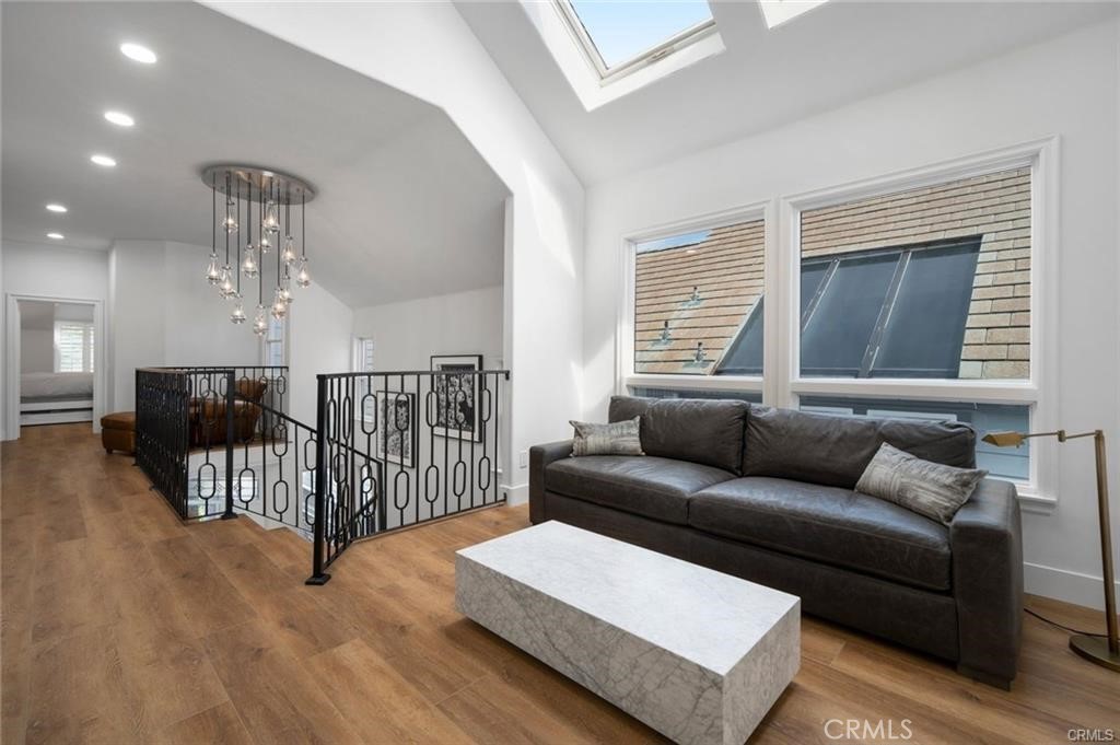 35555 Beach Road Dana Point, CA 92624 - Photo 46 of 68 a living room with furniture and wooden floor