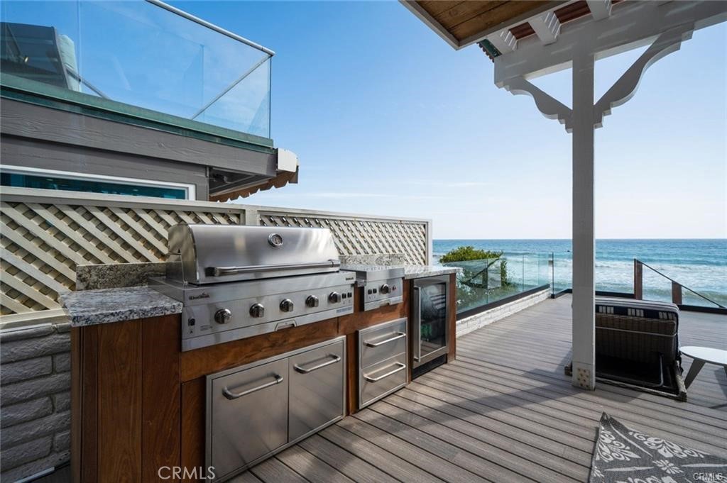 35555 Beach Road Dana Point, CA 92624 - Photo 48 of 68 a kitchen with stove and cabinets