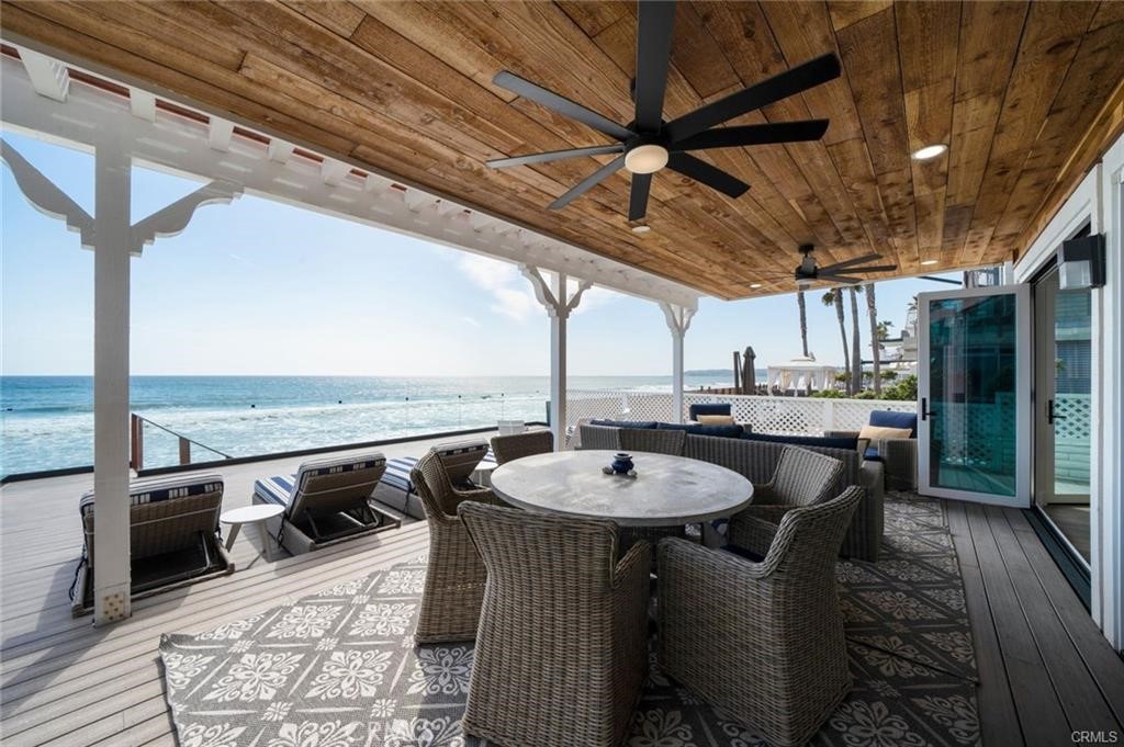 35555 Beach Road Dana Point, CA 92624 - Photo 49 of 68 a view of a patio with a table and chairs