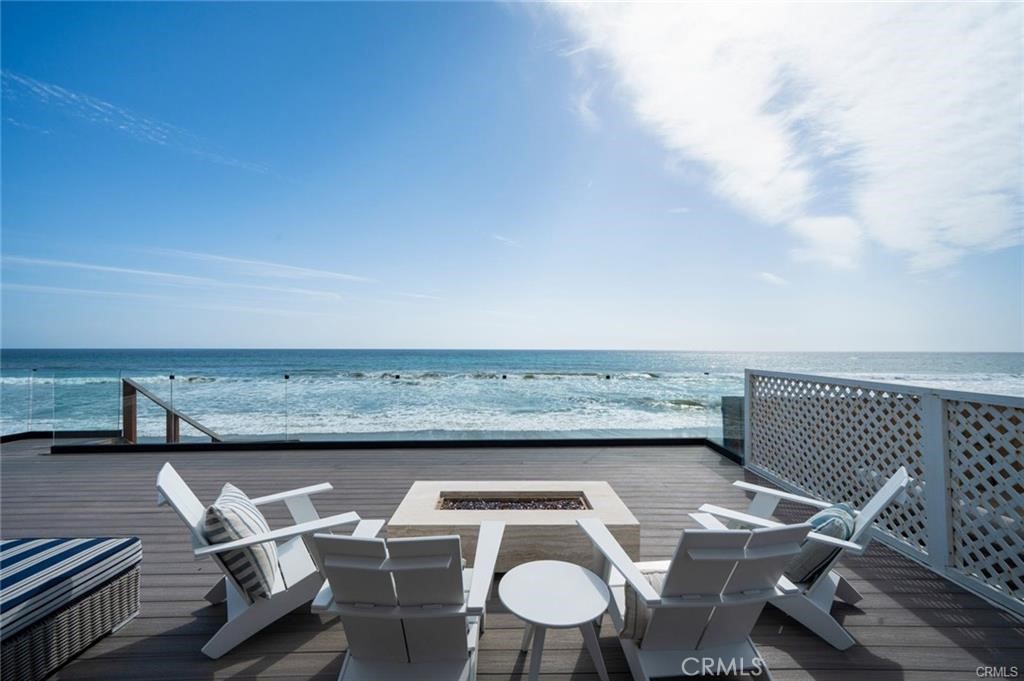 35555 Beach Road Dana Point, CA 92624 - Photo 58 of 68 an aerial view of a chairs and table on the terrace