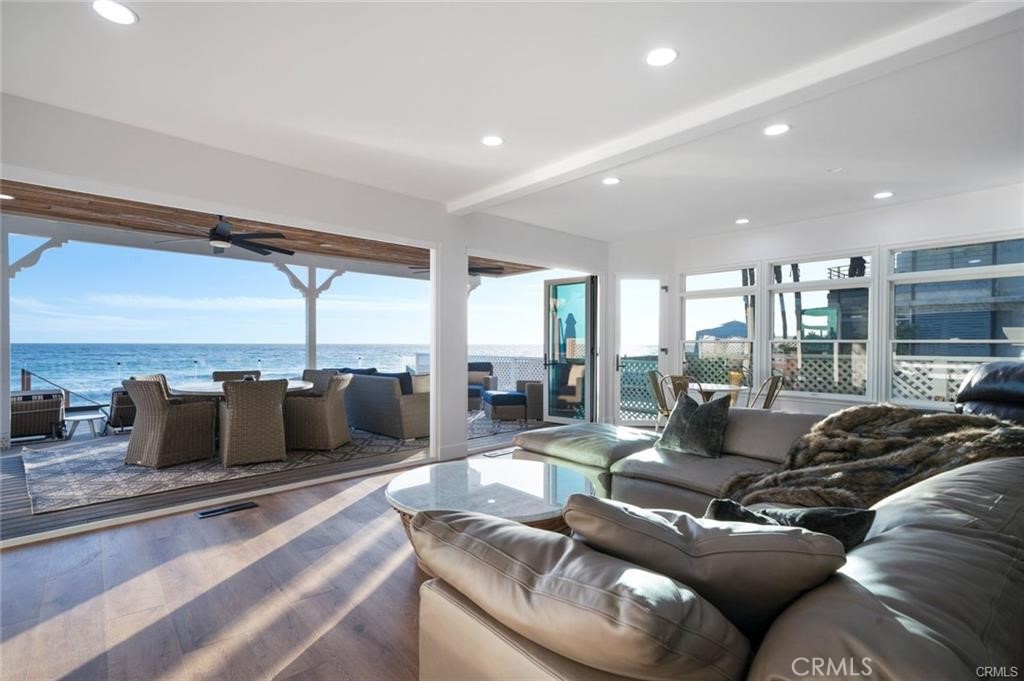 35555 Beach Road Dana Point, CA 92624 - Photo 62 of 68 a living room with furniture and a flat screen tv