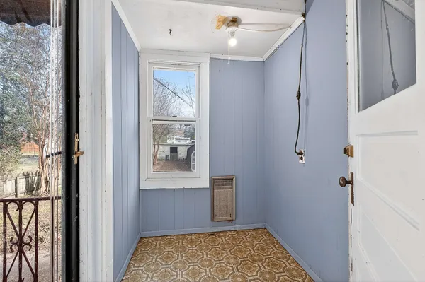 a kitchen with a stove a sink and a refrigerator
