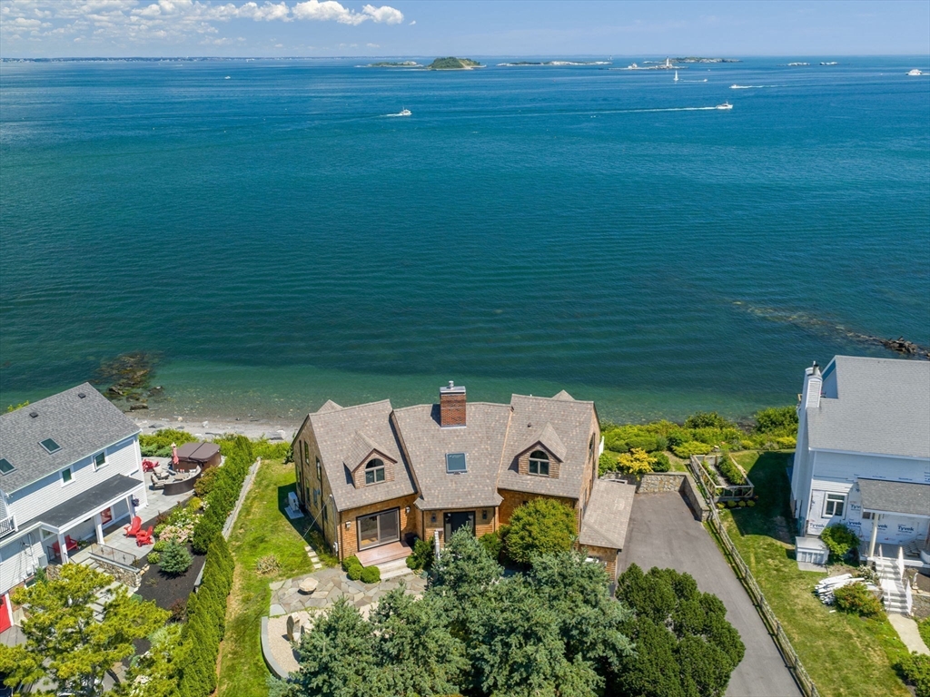 an aerial view of a house with a garden