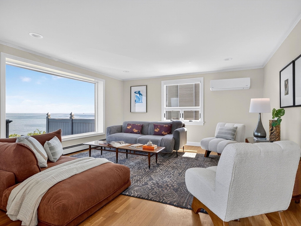 57 Harborview Road Hull, MA 02045 - Photo 15 of 41 a living room with furniture and a window