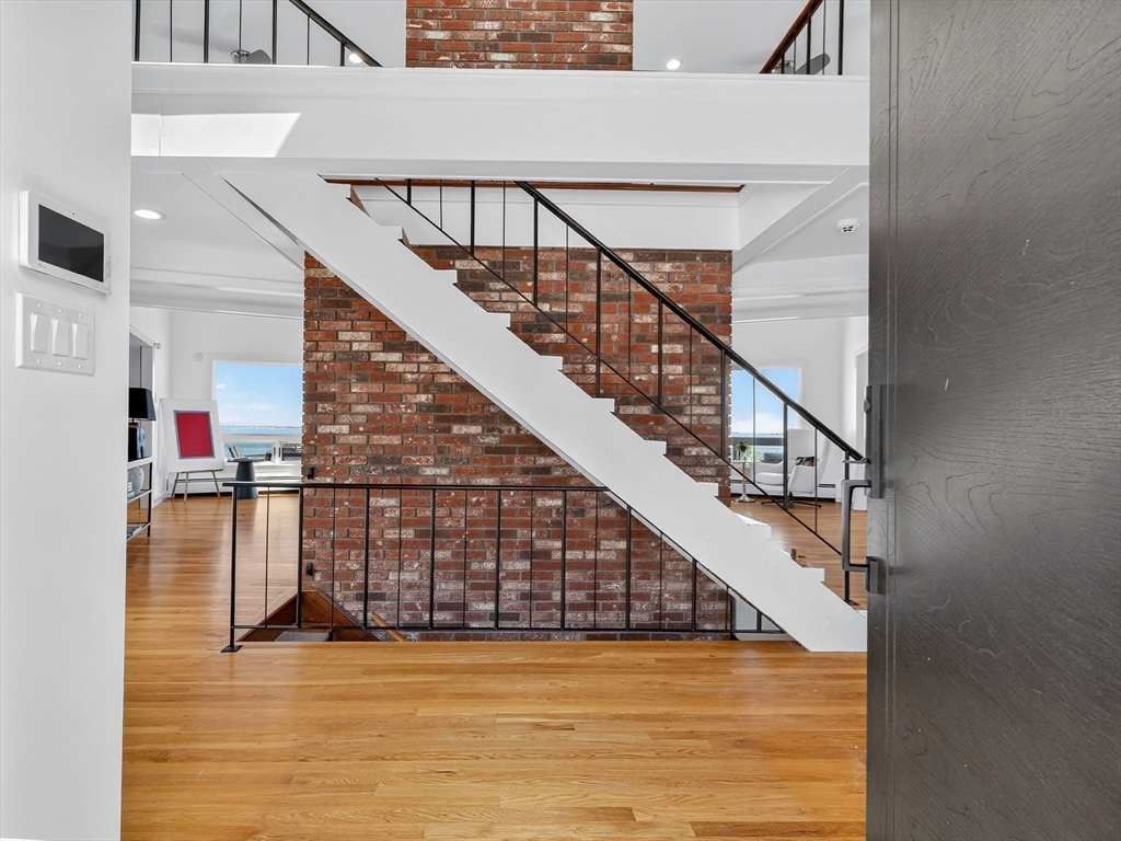 57 Harborview Road Hull, MA 02045 - Photo 20 of 41 a view of entryway and hall with wooden floor