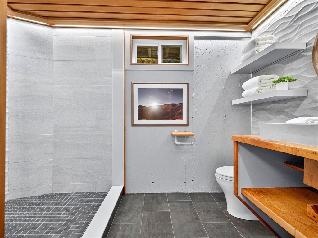 57 Harborview Road Hull, MA 02045 - Photo 32 of 41 a view of a room with wooden floor and cabinet