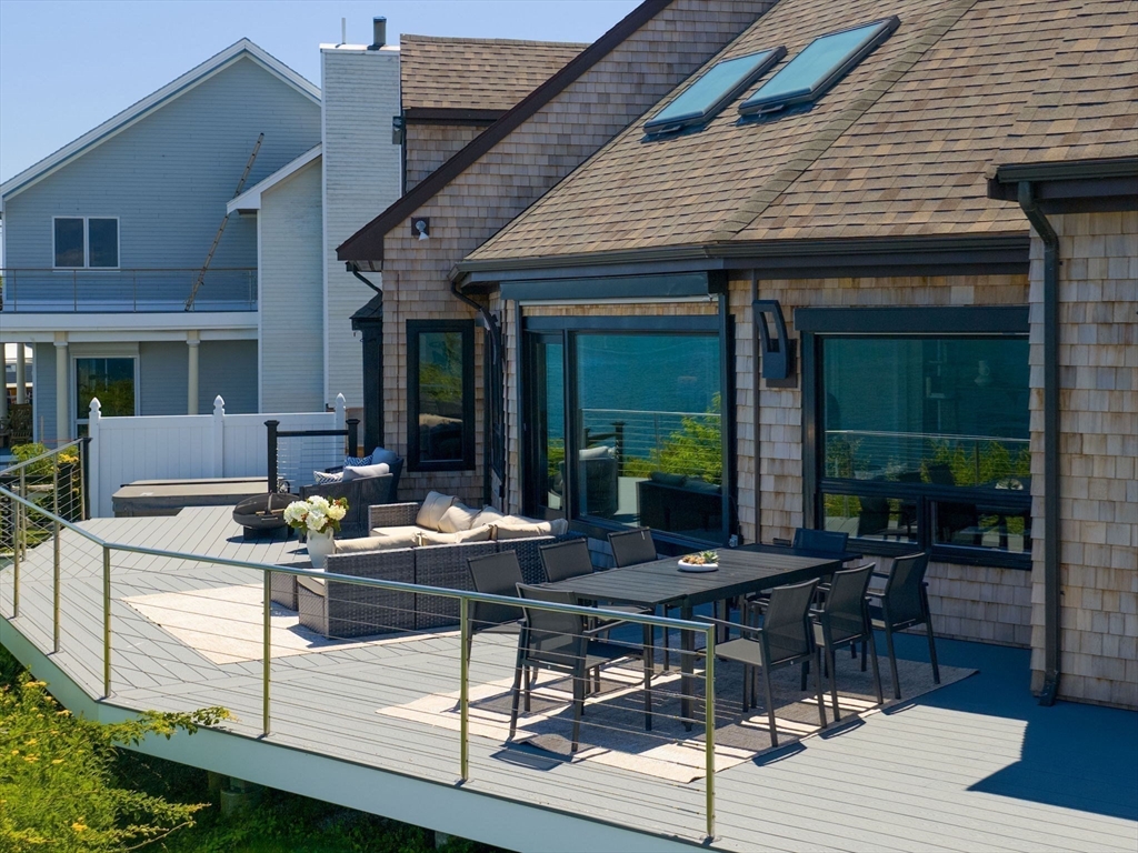 57 Harborview Road Hull, MA 02045 - Photo 37 of 41 a outdoor space with lots of tables and chairs