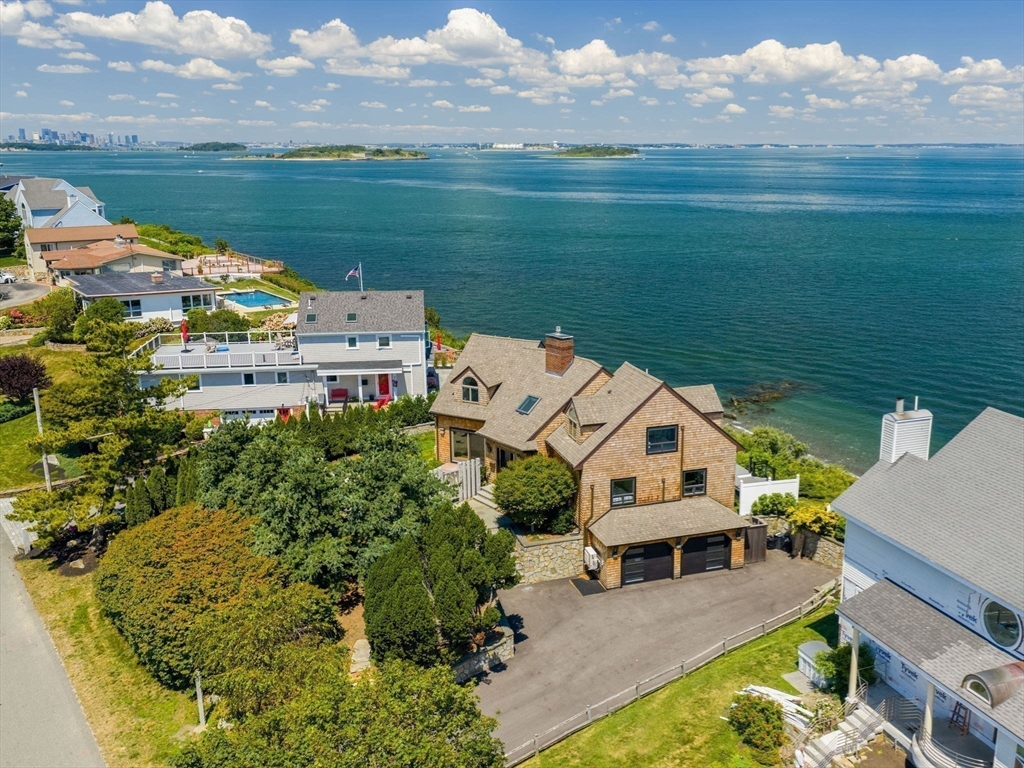 57 Harborview Road Hull, MA 02045 - Photo 39 of 41 an aerial view of a house with a garden and lake view