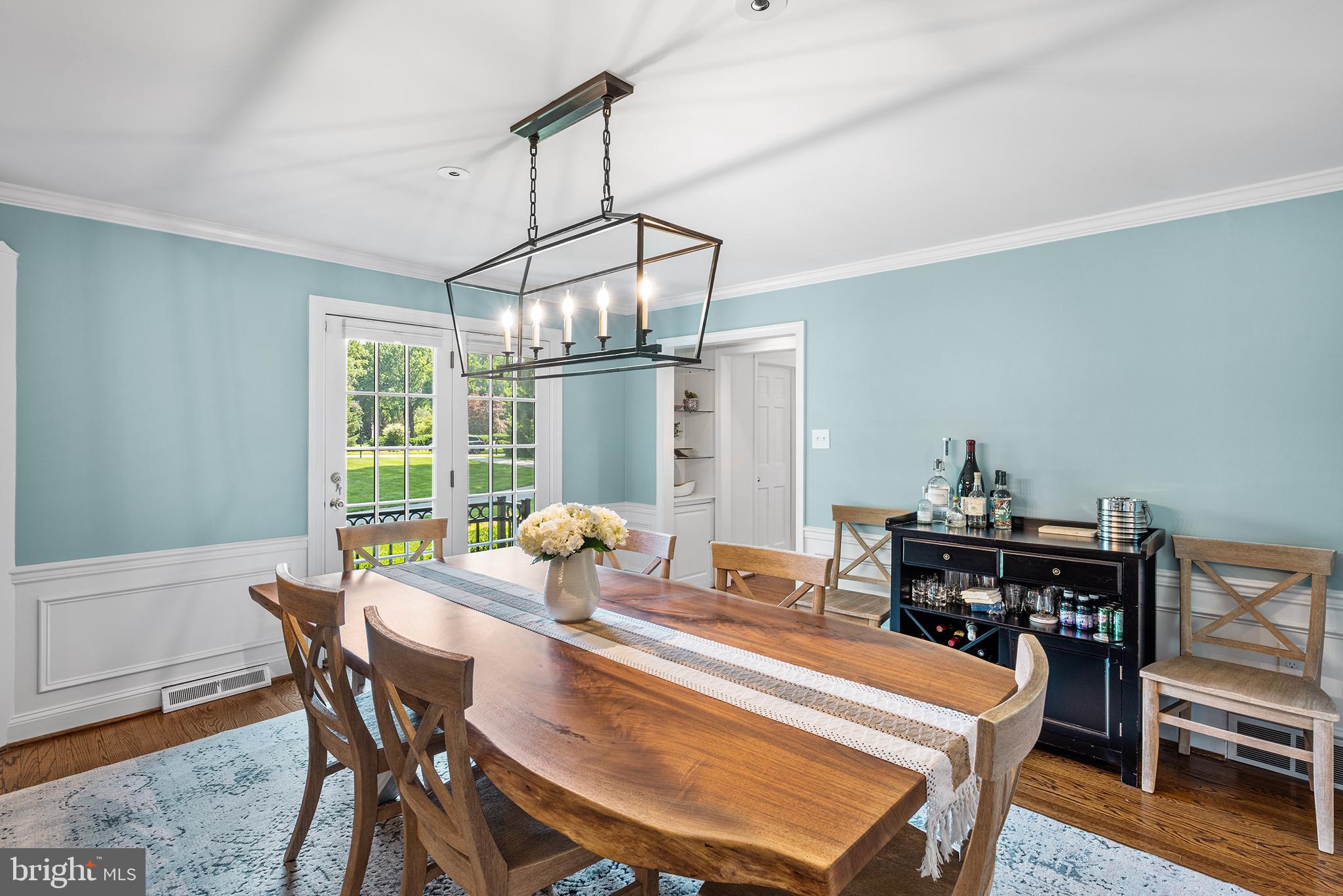 1263 Argyle Road Berwyn, PA 19312 - Photo 19 of 60 a dining room with furniture a chandelier and wooden floor