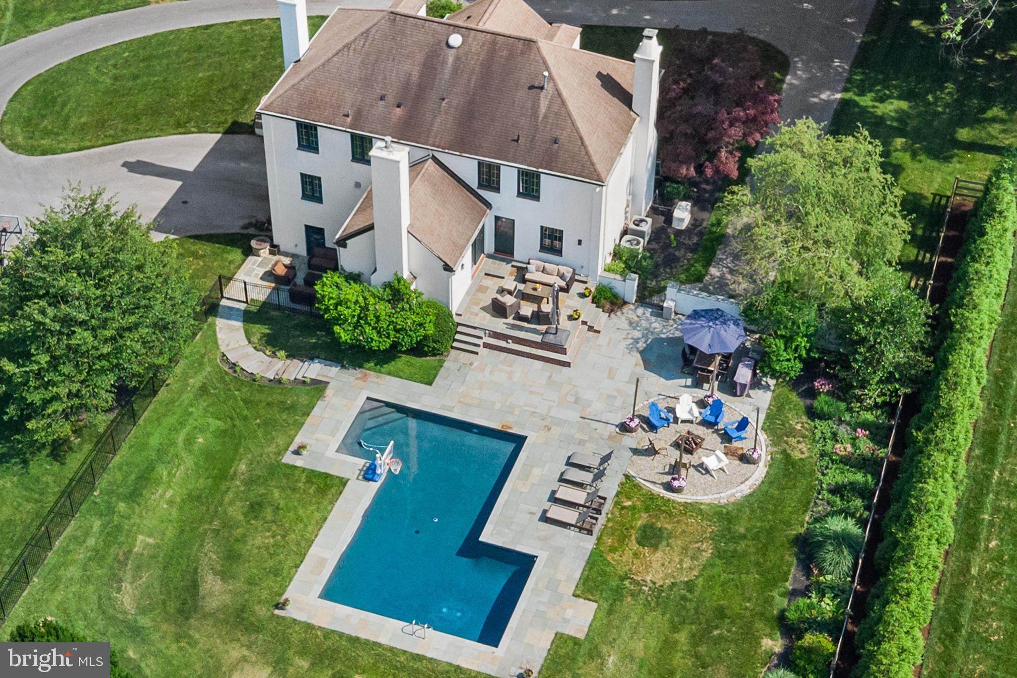 1263 Argyle Road Berwyn, PA 19312 - Photo 46 of 60 an aerial view of a house with swimming pool a yard and outdoor seating