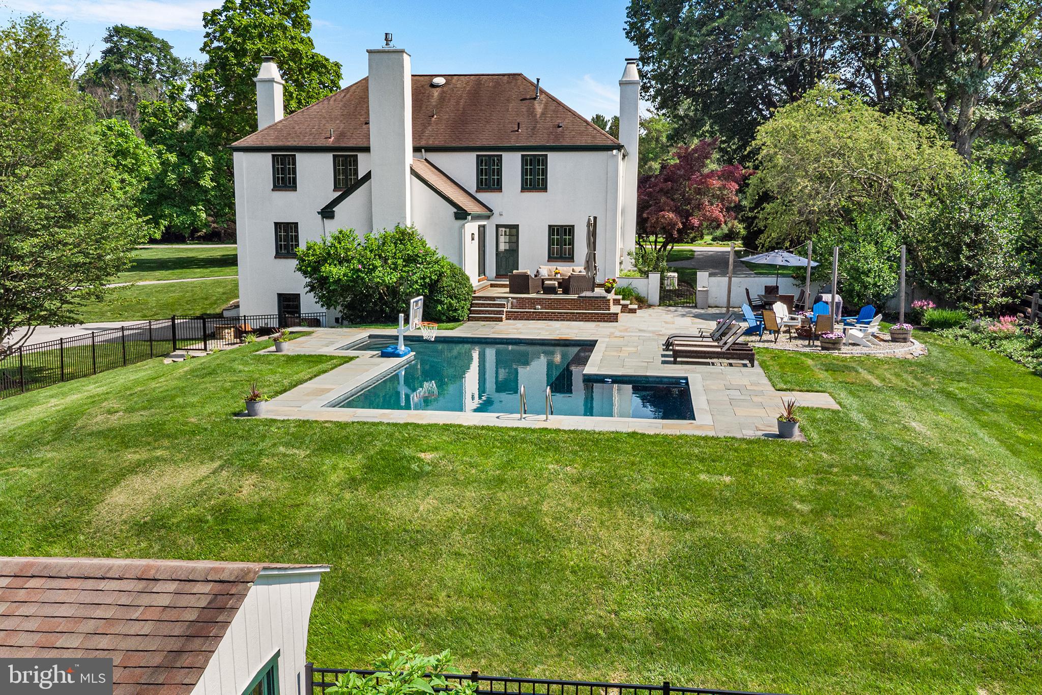 1263 Argyle Road Berwyn, PA 19312 - Photo 47 of 60 a front view of a house with swimming pool having outdoor seating
