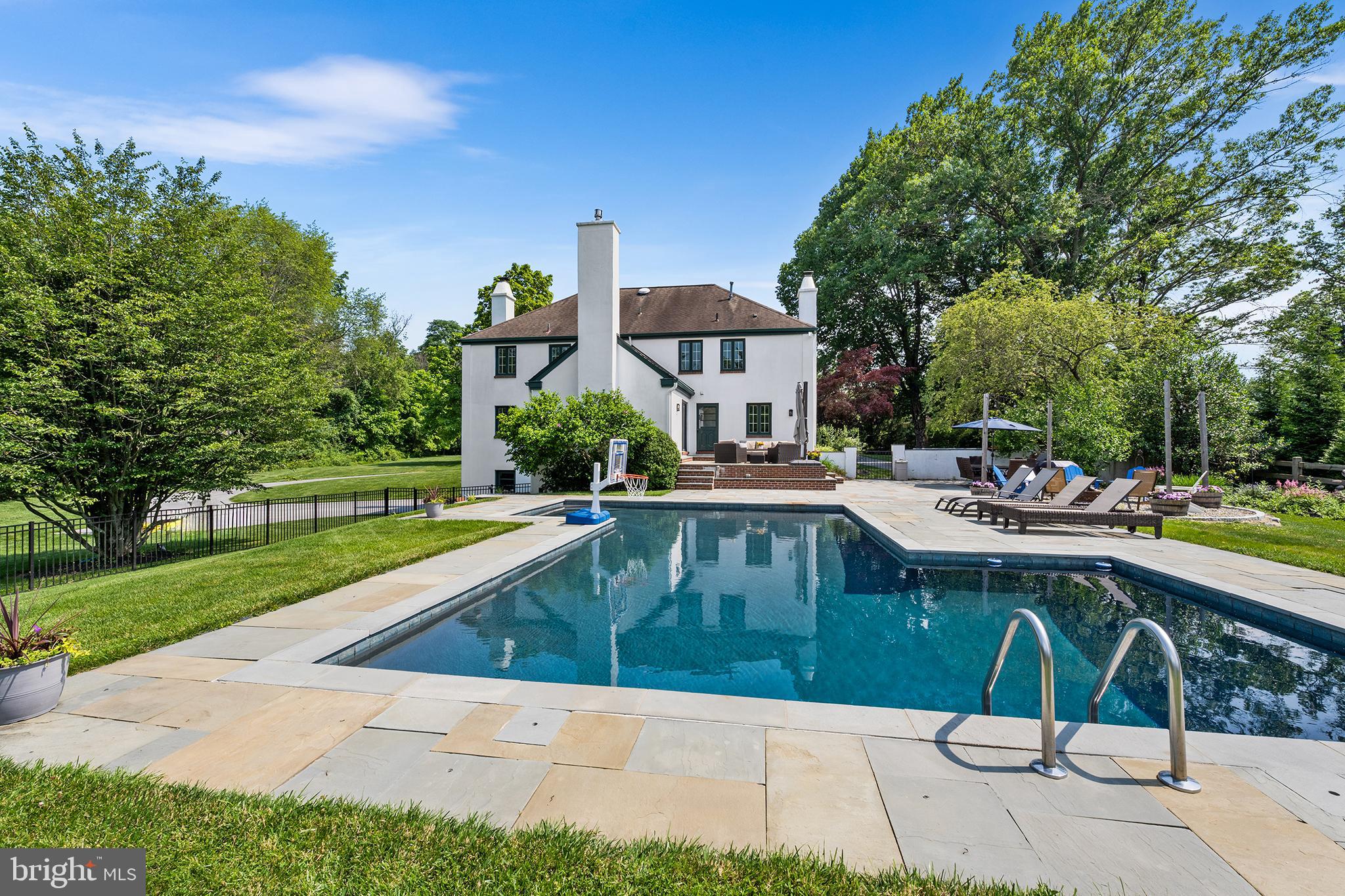 1263 Argyle Road Berwyn, PA 19312 - Photo 48 of 60 a swimming pool with outdoor seating and yard