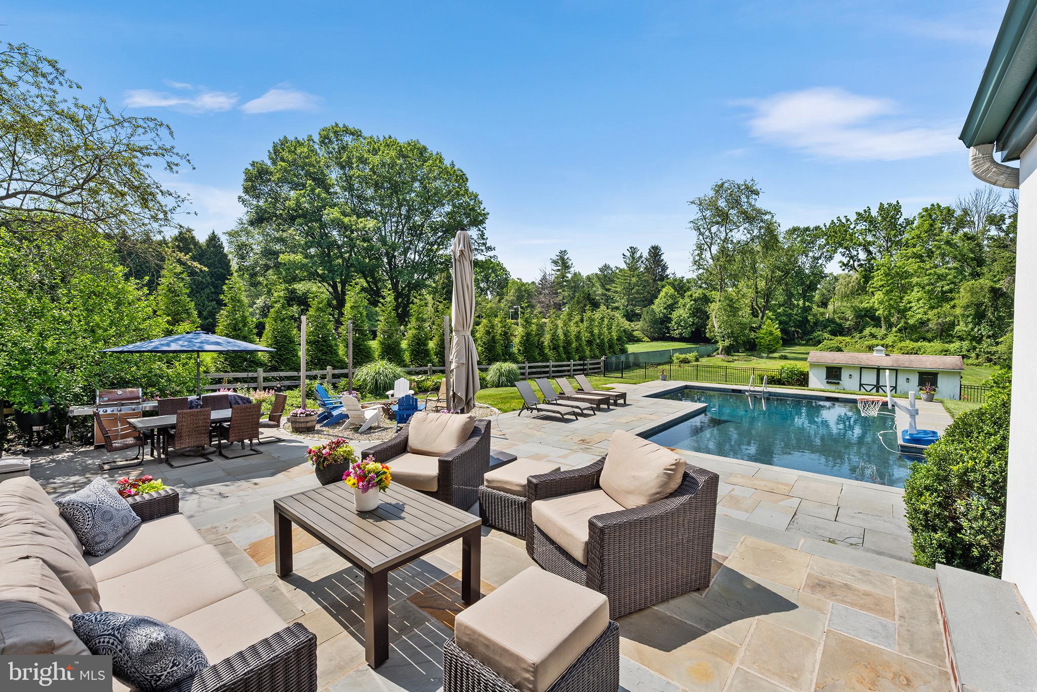 1263 Argyle Road Berwyn, PA 19312 - Photo 8 of 60 a view of swimming pool with outdoor seating and plants