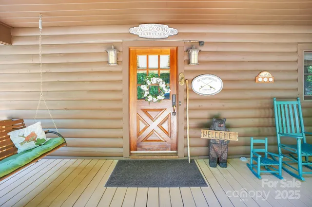 a view of a door and wooden floor