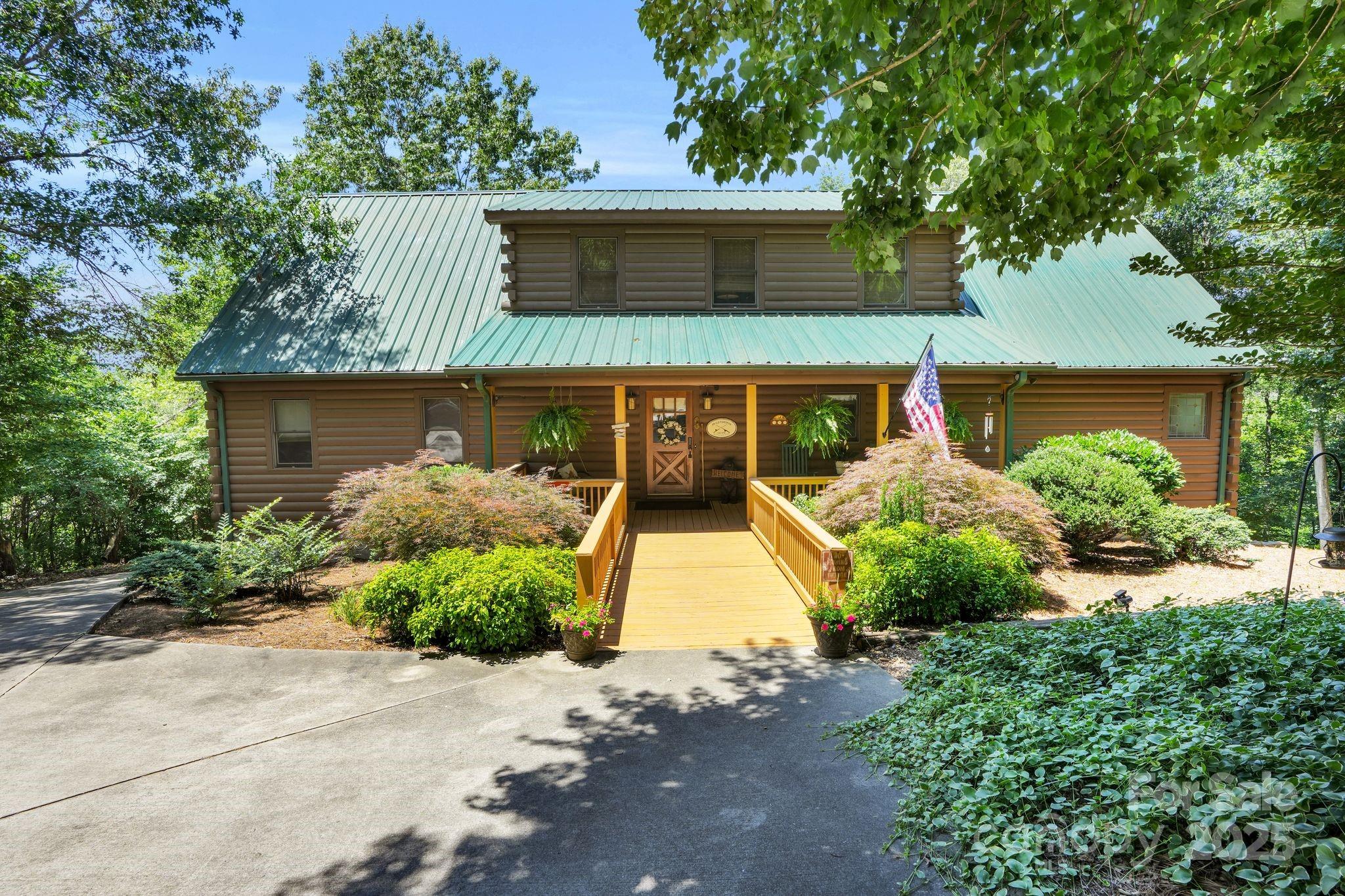 210 Big Rock Road Blacksburg, SC 29702 - Photo 2 of 46 front view of a house with a yard