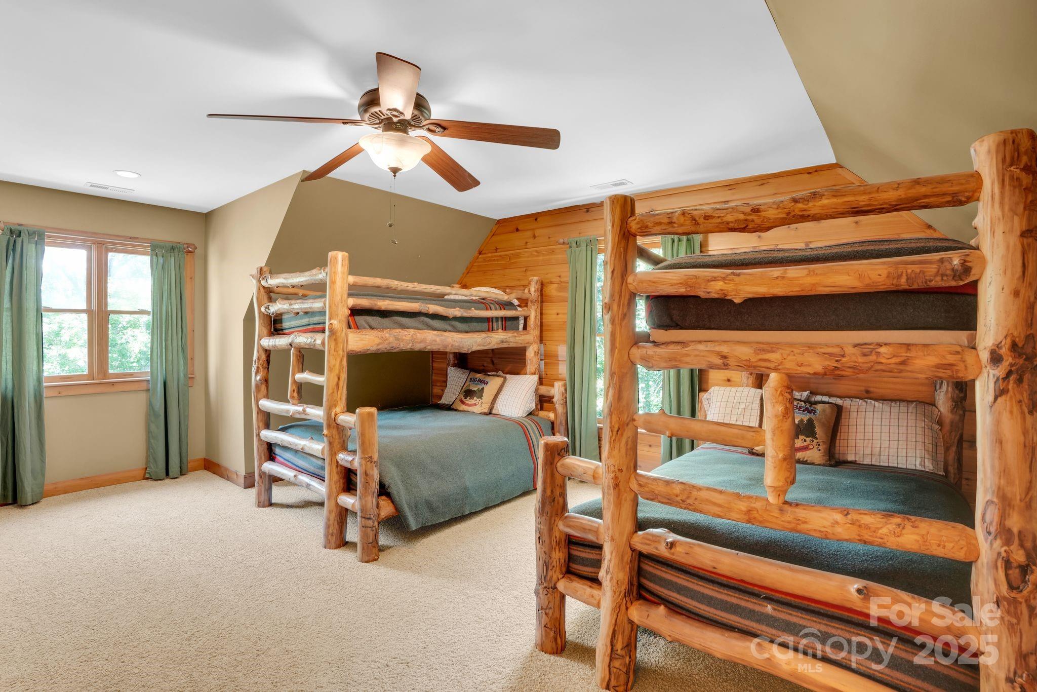 210 Big Rock Road Blacksburg, SC 29702 - Photo 25 of 46 a bedroom with furniture and a window