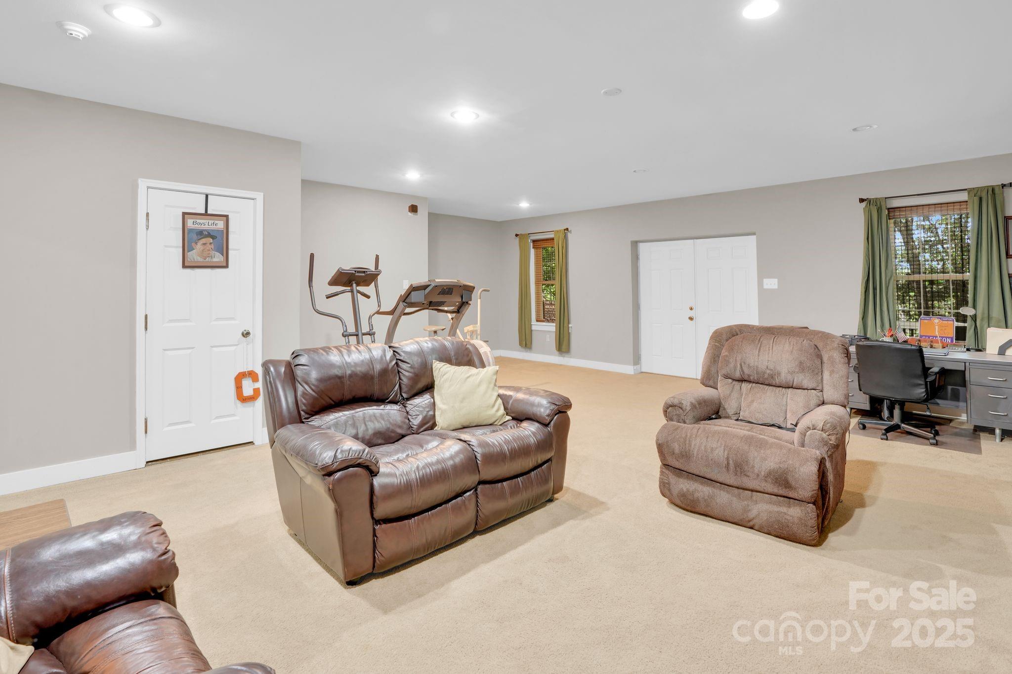 210 Big Rock Road Blacksburg, SC 29702 - Photo 29 of 46 a living room with furniture and a large window