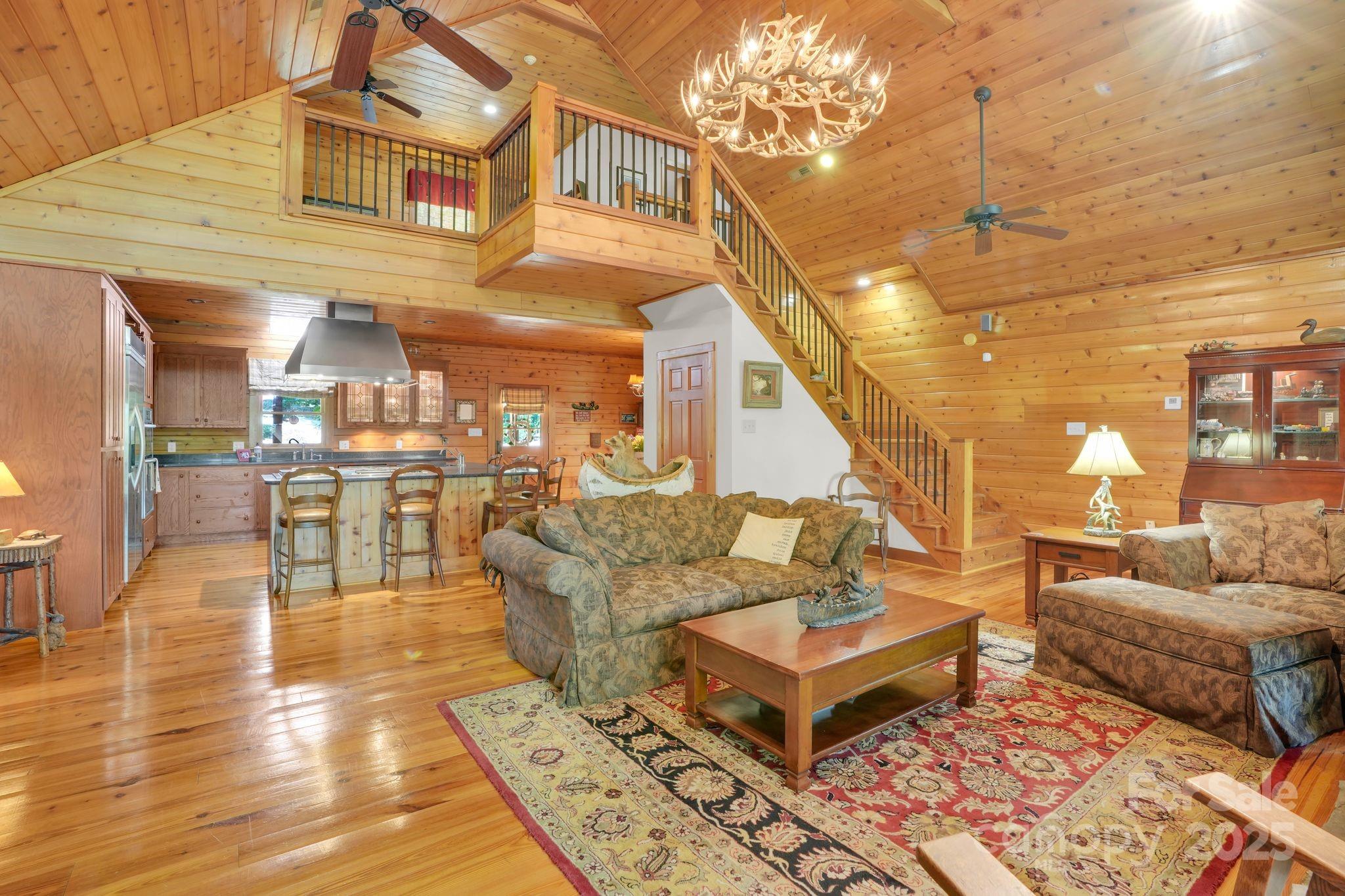 210 Big Rock Road Blacksburg, SC 29702 - Photo 3 of 46 a living room with fireplace furniture and a rug
