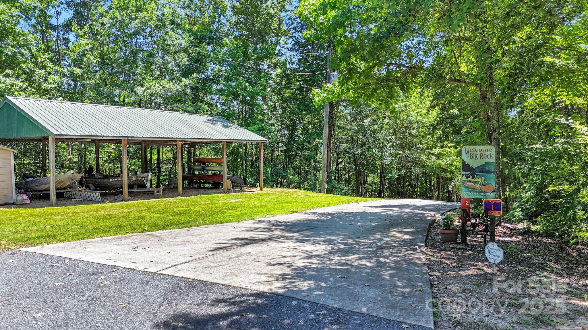210 Big Rock Road Blacksburg, SC 29702 - Photo 34 of 46 a view of a house with backyard and sitting area