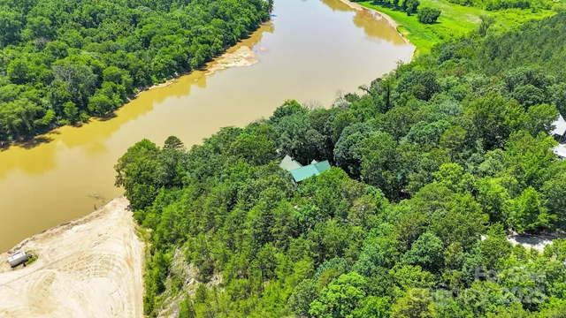 a view of a garden with an ocean