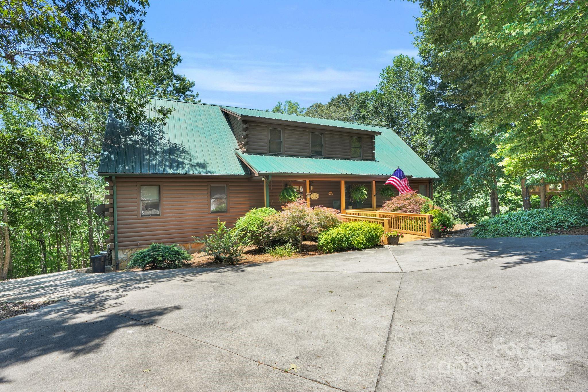 210 Big Rock Road Blacksburg, SC 29702 - Photo 46 of 46 a front view of a house with a yard and garage
