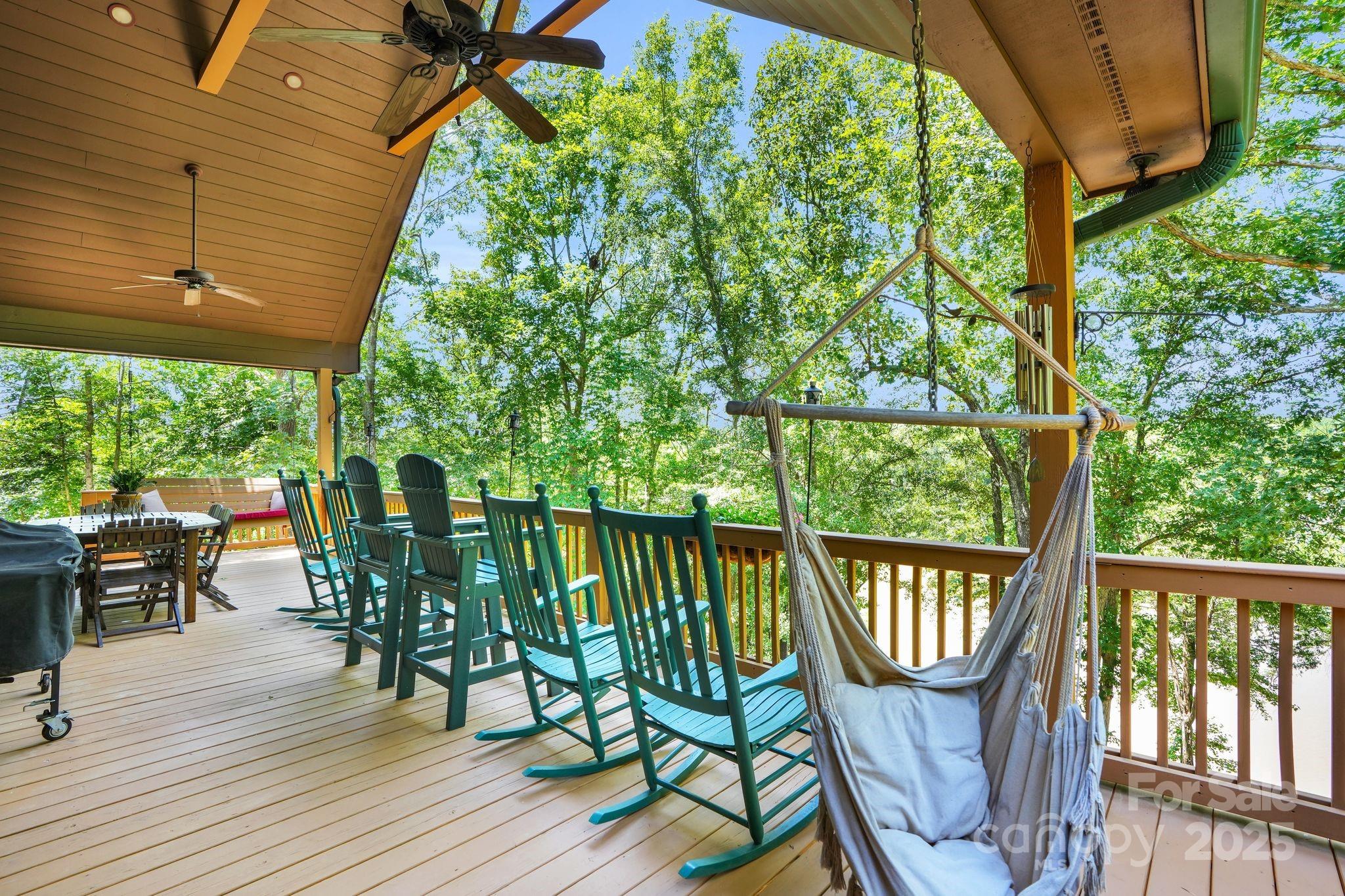 210 Big Rock Road Blacksburg, SC 29702 - Photo 8 of 46 a view of a chairs on the deck