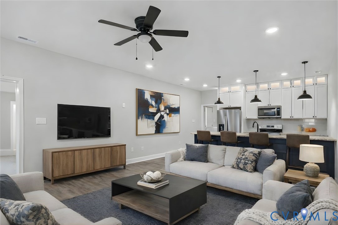 302 Cedar Grove Road Farnham, VA 22460 - Photo 2 of 23 a living room with furniture and a flat screen tv