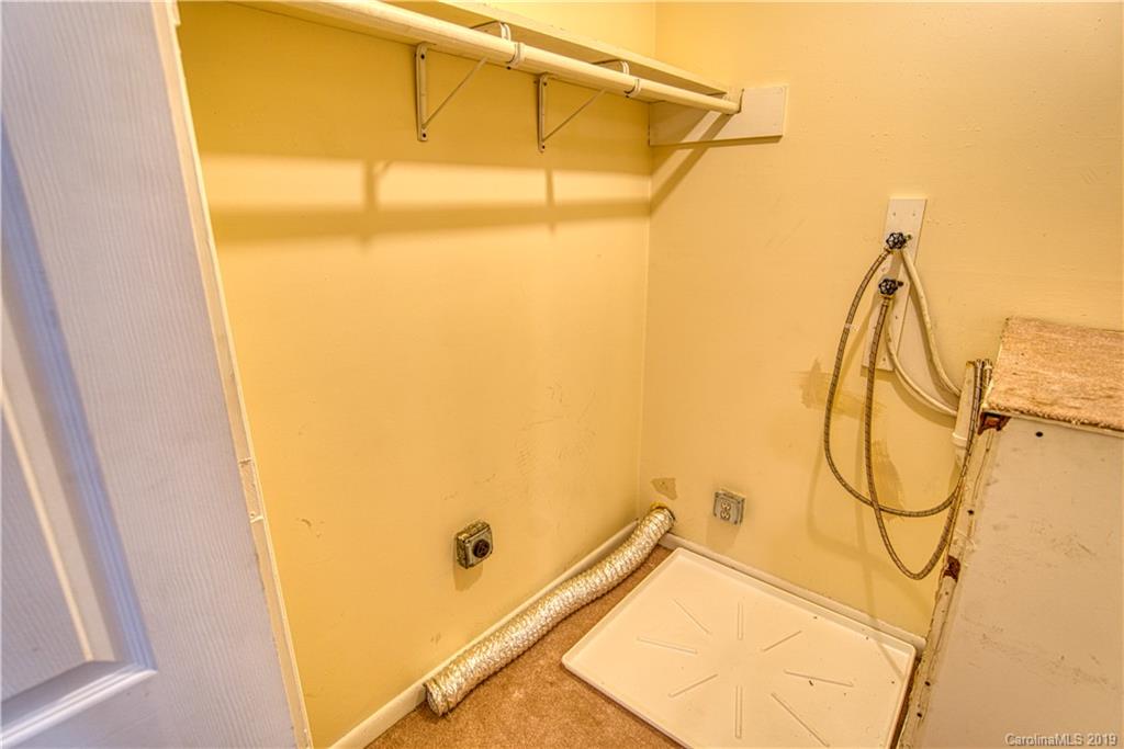 2616 Park Road, Unit H Charlotte, NC 28209 - Photo 17 of 28 a view of a room with painted walls