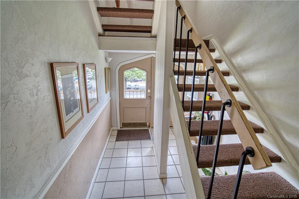 2616 Park Road, Unit H Charlotte, NC 28209 - Photo 3 of 28 a view of an entryway with wooden floor