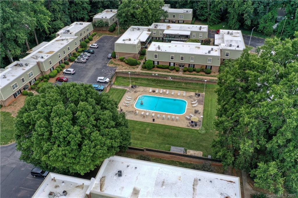 2616 Park Road, Unit H Charlotte, NC 28209 - Photo 26 of 28 an aerial view of a house with a yard