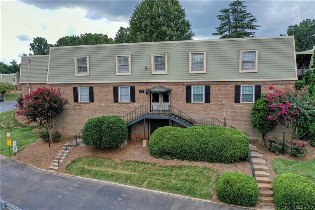 2616 Park Road, Unit H Charlotte, NC 28209 - Photo 28 of 28 a house view with a garden space