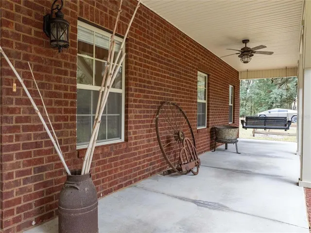 a view of backyard with large trees