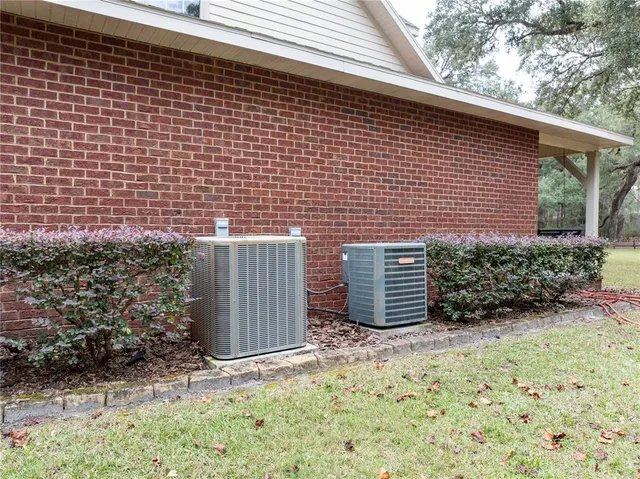 a view of a field with tree in the background