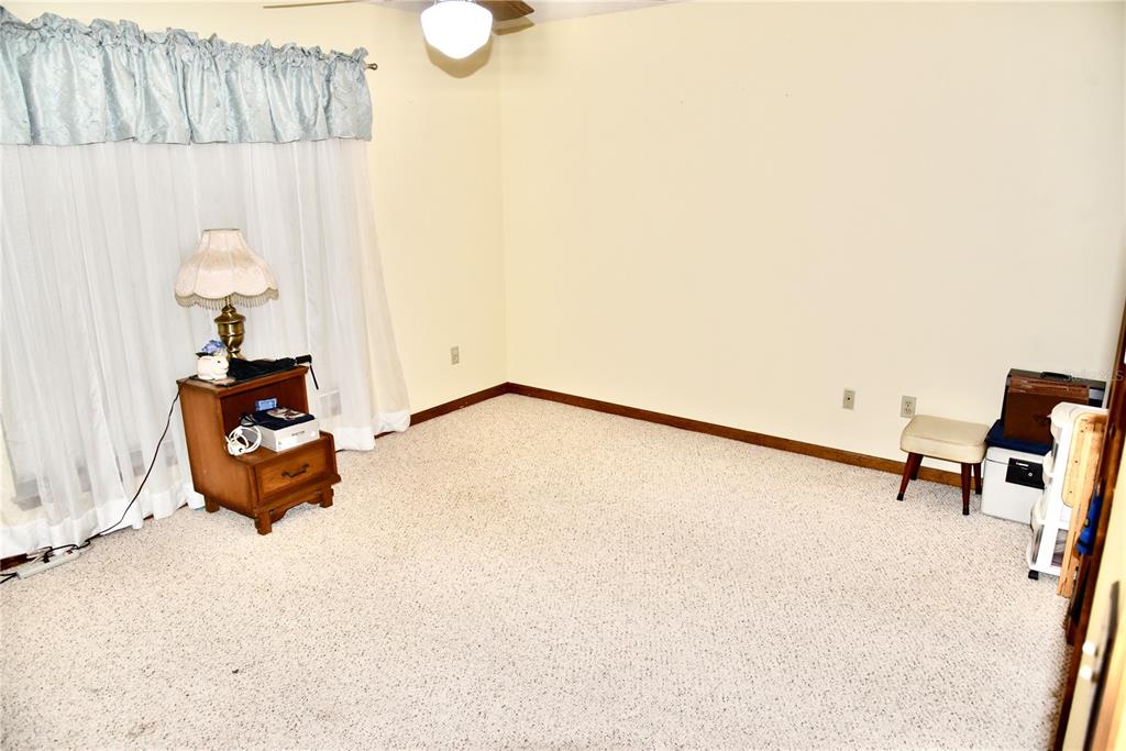 8230 Lenox Avenue Jacksonville, FL 32221 - Photo 11 of 34 a view of a room with table and a chair