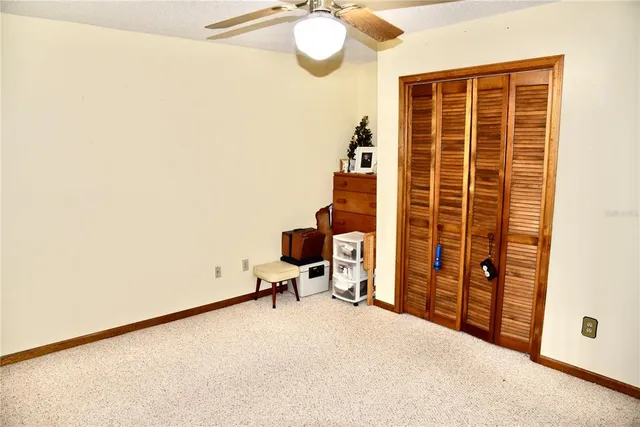a bedroom with furniture and a bed