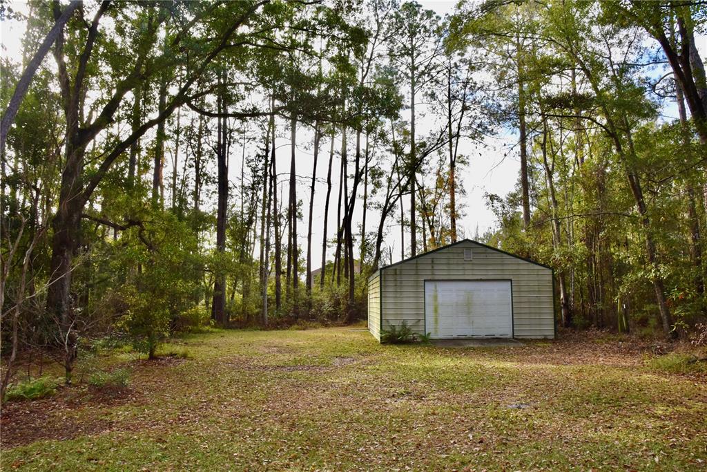 8230 Lenox Avenue Jacksonville, FL 32221 - Photo 22 of 34 a house with trees in front of it