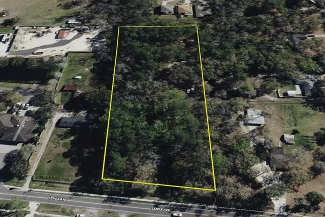 an aerial view of a residential houses