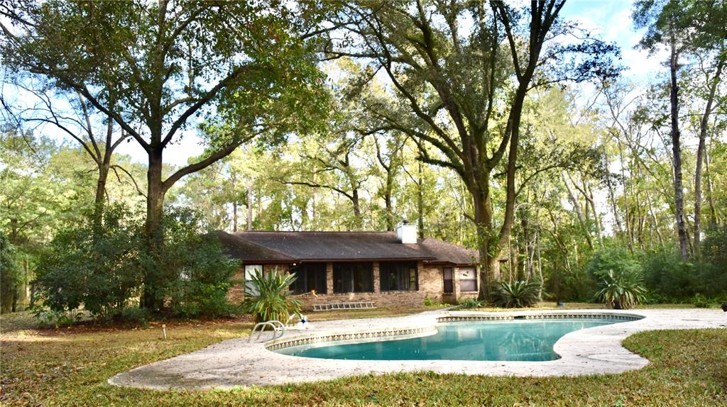 8230 Lenox Avenue Jacksonville, FL 32221 - Photo 7 of 34 a front view of a house with garden