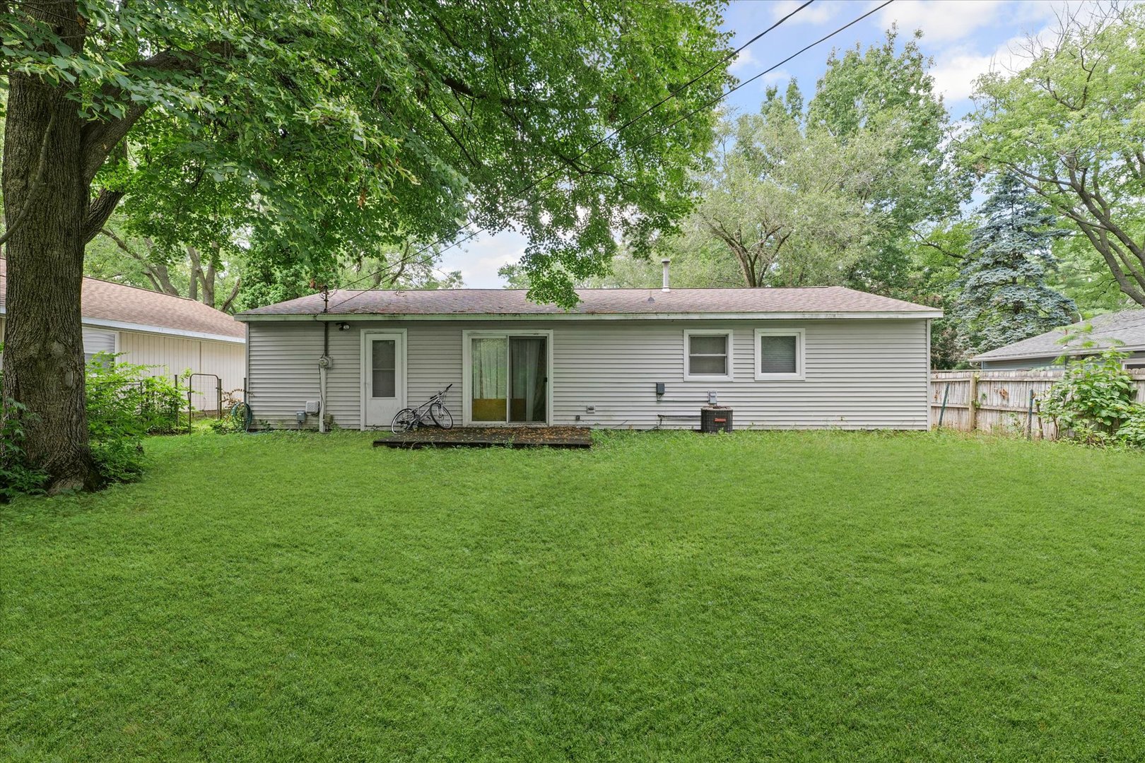 1104 Lanore Drive Urbana, IL 61802 - Photo 13 of 16 a view of a house with a backyard